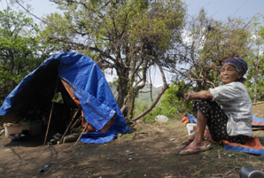 A displaced Kachin woman - Flickr / Trocair