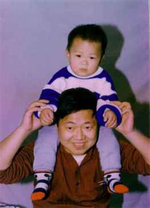 Pastor Cai with his son