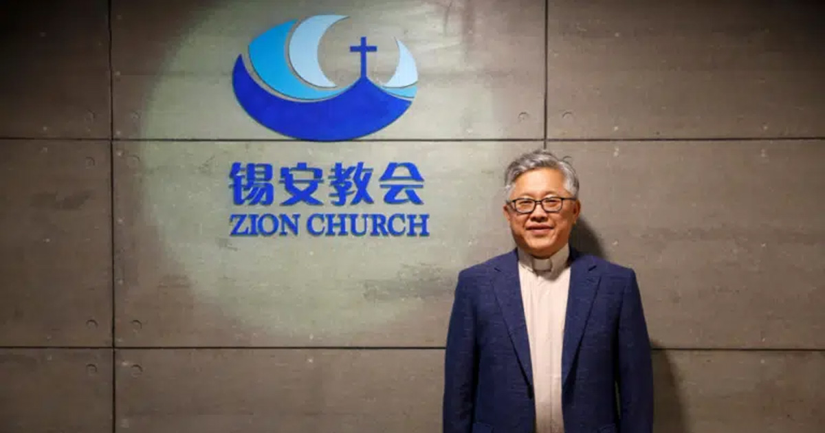 Pastor Ezra Jin Mingri is smiling beside the Zion Church logo. Pastor Ezra Jin Mingri is smiling beside the Zion Church logo.
