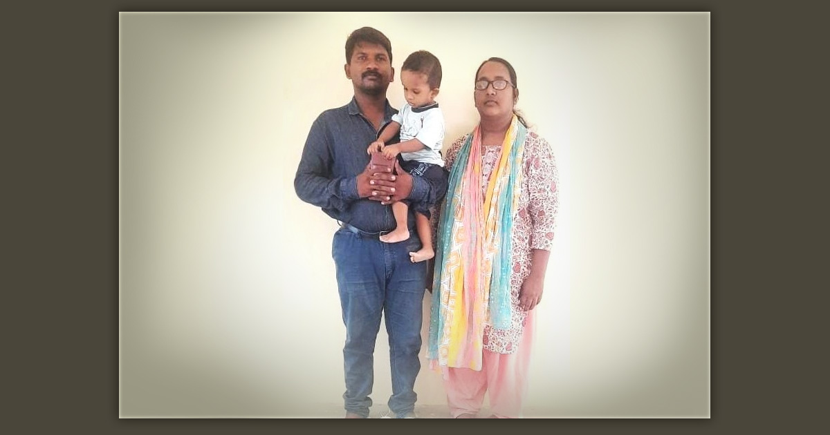 Pastor Kirubendran with his wife and child.