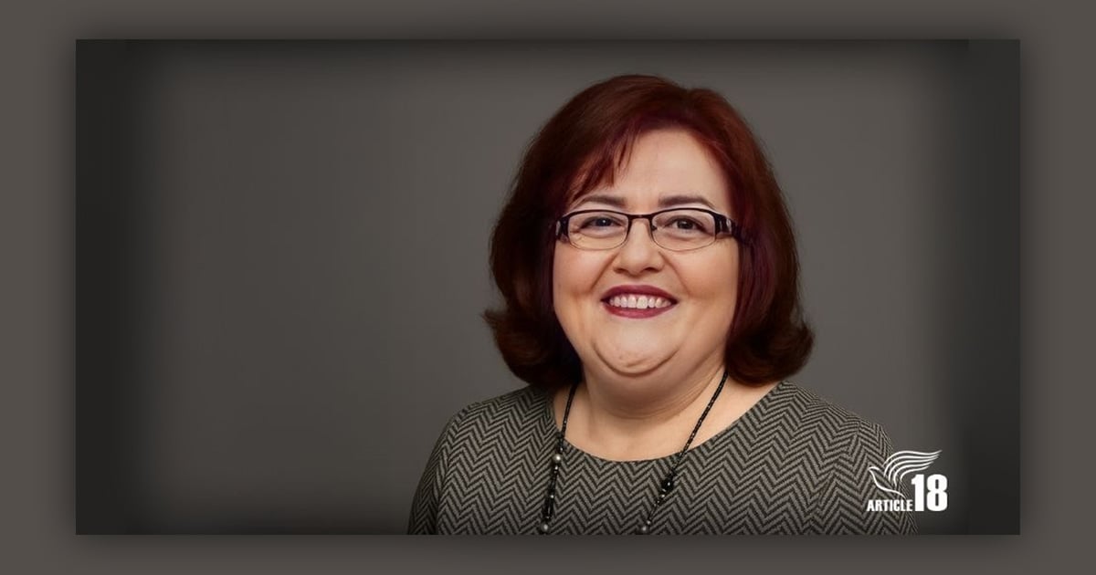 Lida Alexani is smiling.