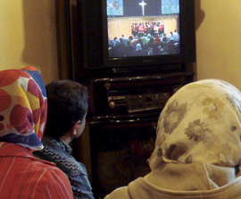 Iranians watching Christian television programing