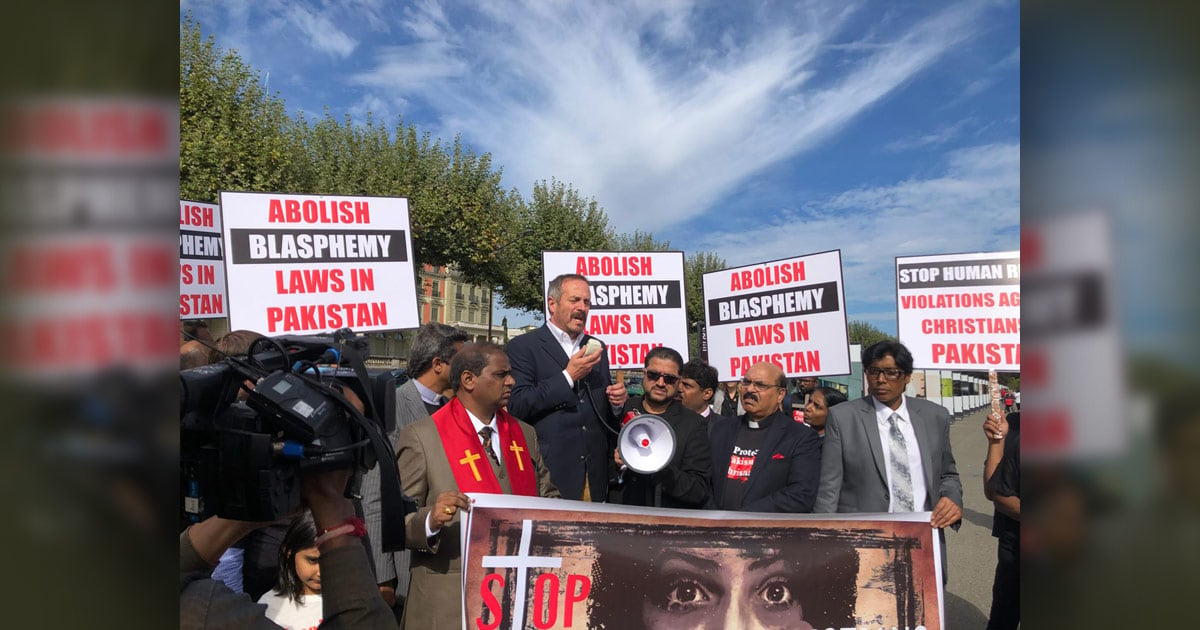 A crowd is gathered in protest against blasphemy laws in Pakistan.