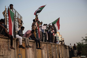 Sudanese people and flags