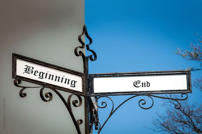 Signpost pointing two directions with the words, 'Beginning' and 'End'