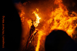 A building is consumed with fire.