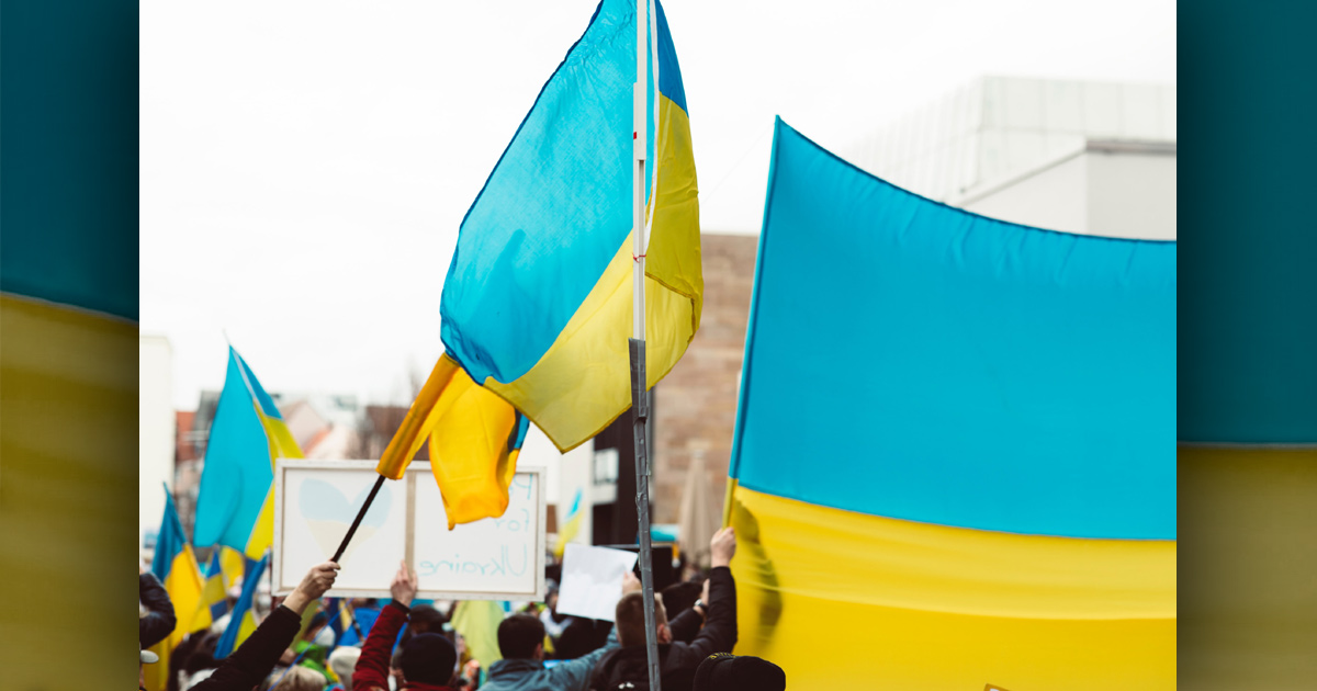 Ukraine flags raised at an anti-war demonstration